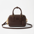 Dark brown mini boxy leather bag, studio shot on white background