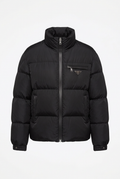 Black quilted puffer jacket, clean studio shot on white background