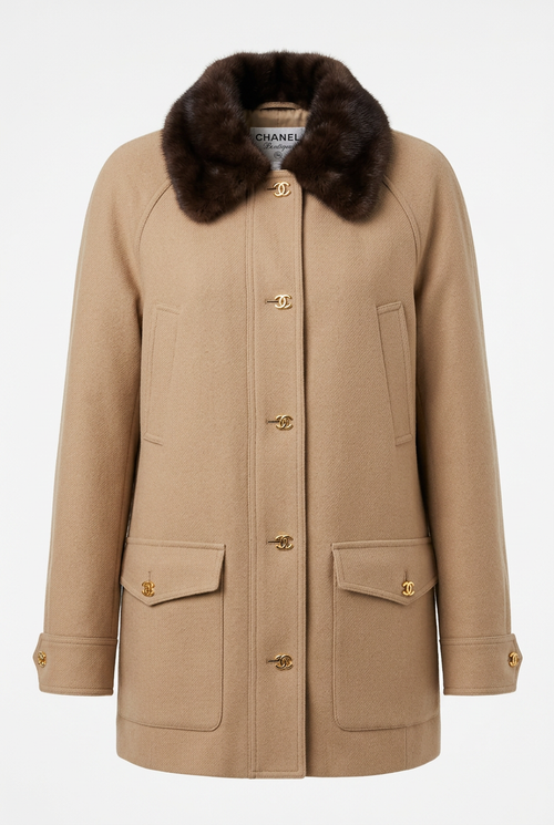 Beige wool jacket with dark fur collar and gold buttons, studio shot on white background