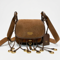 Tan suede saddle bag with gold ring fringe, studio shot on white background